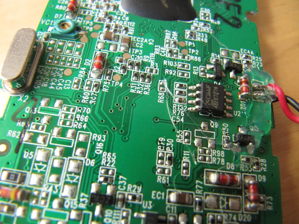 Densely populated electronic control board with resistors and capacitors